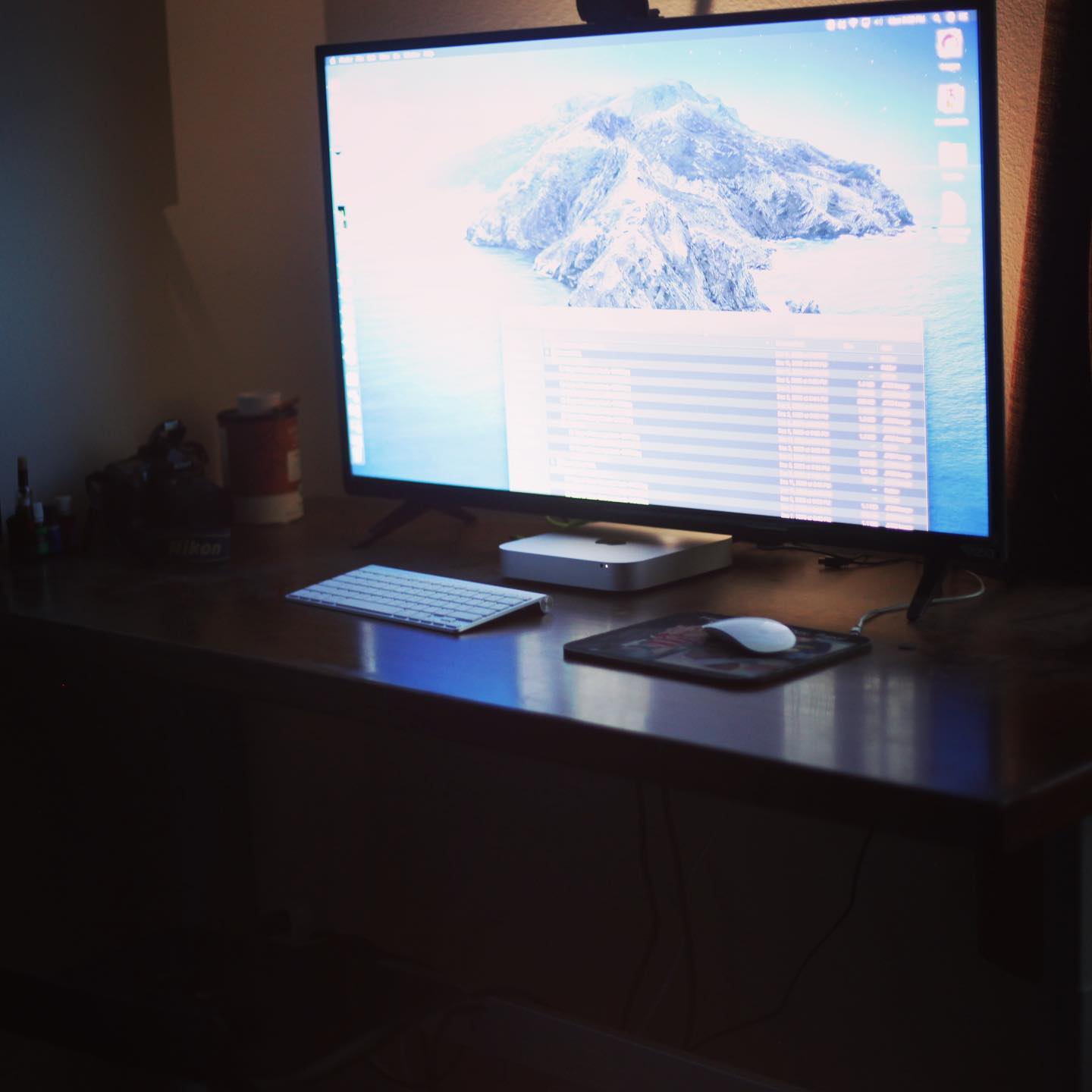 This is my editing standing desk with a large ultra sharp display powered by a Mac Mini.